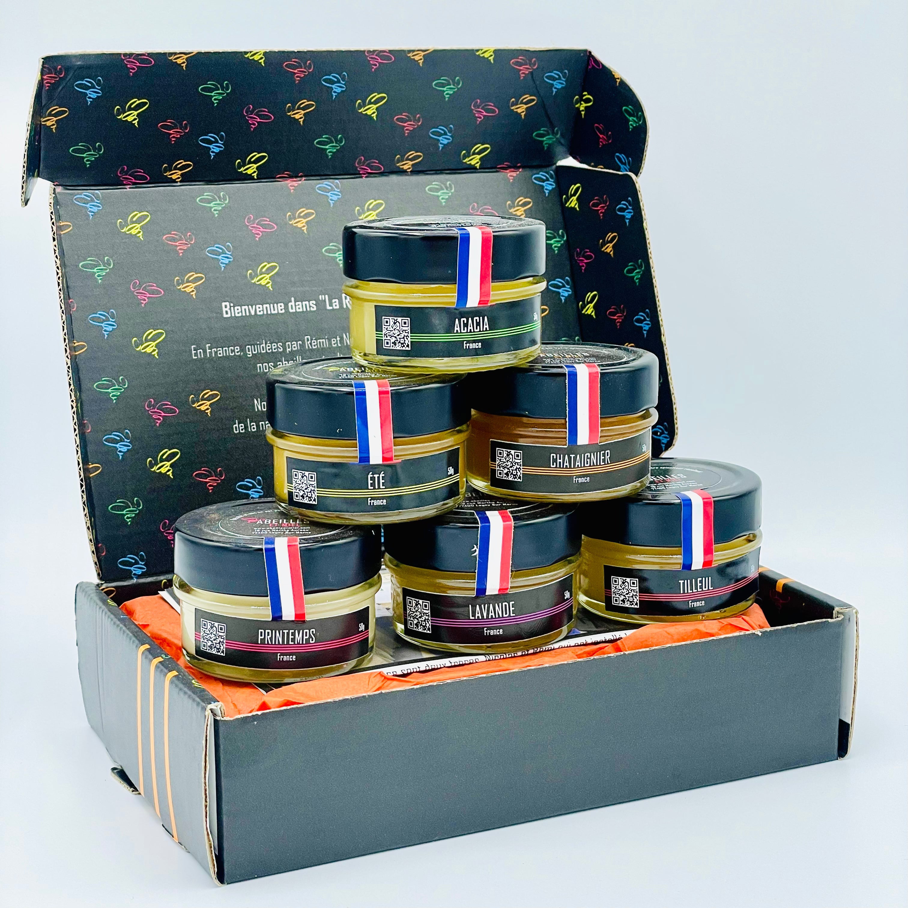 Collection de coffrets cadeaux réunissant miels et produits artisanaux de la miellerie.