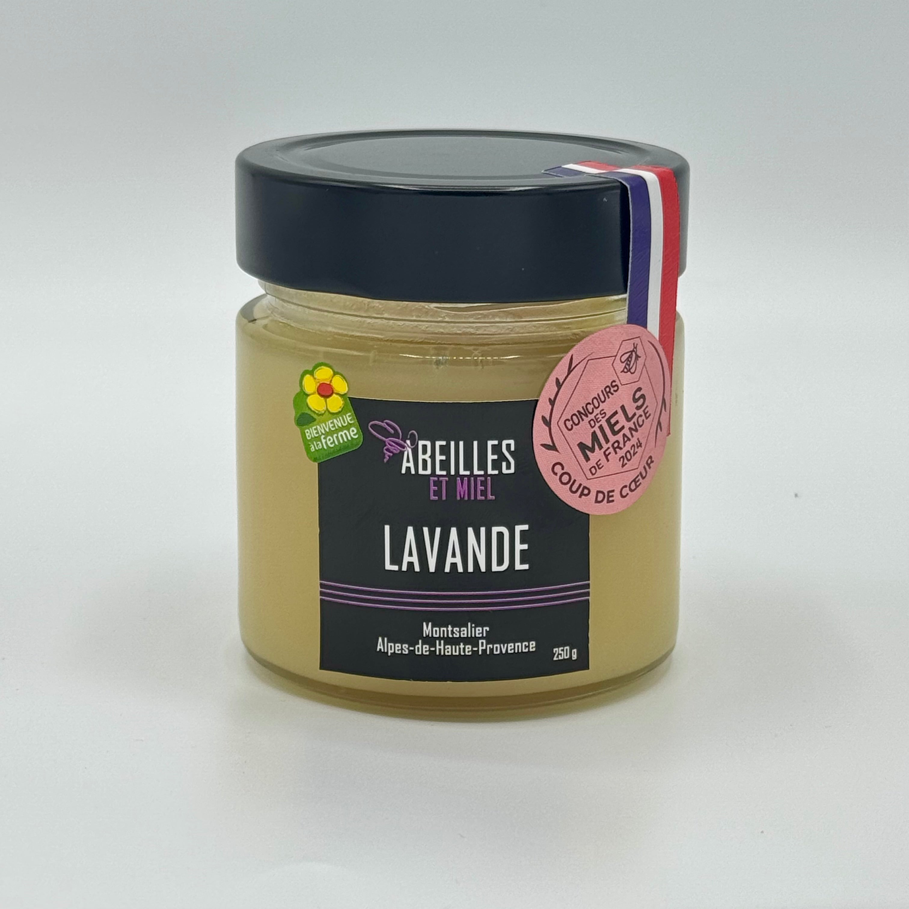 Pot de miel de lavande français au parfum floral et texture douce.
