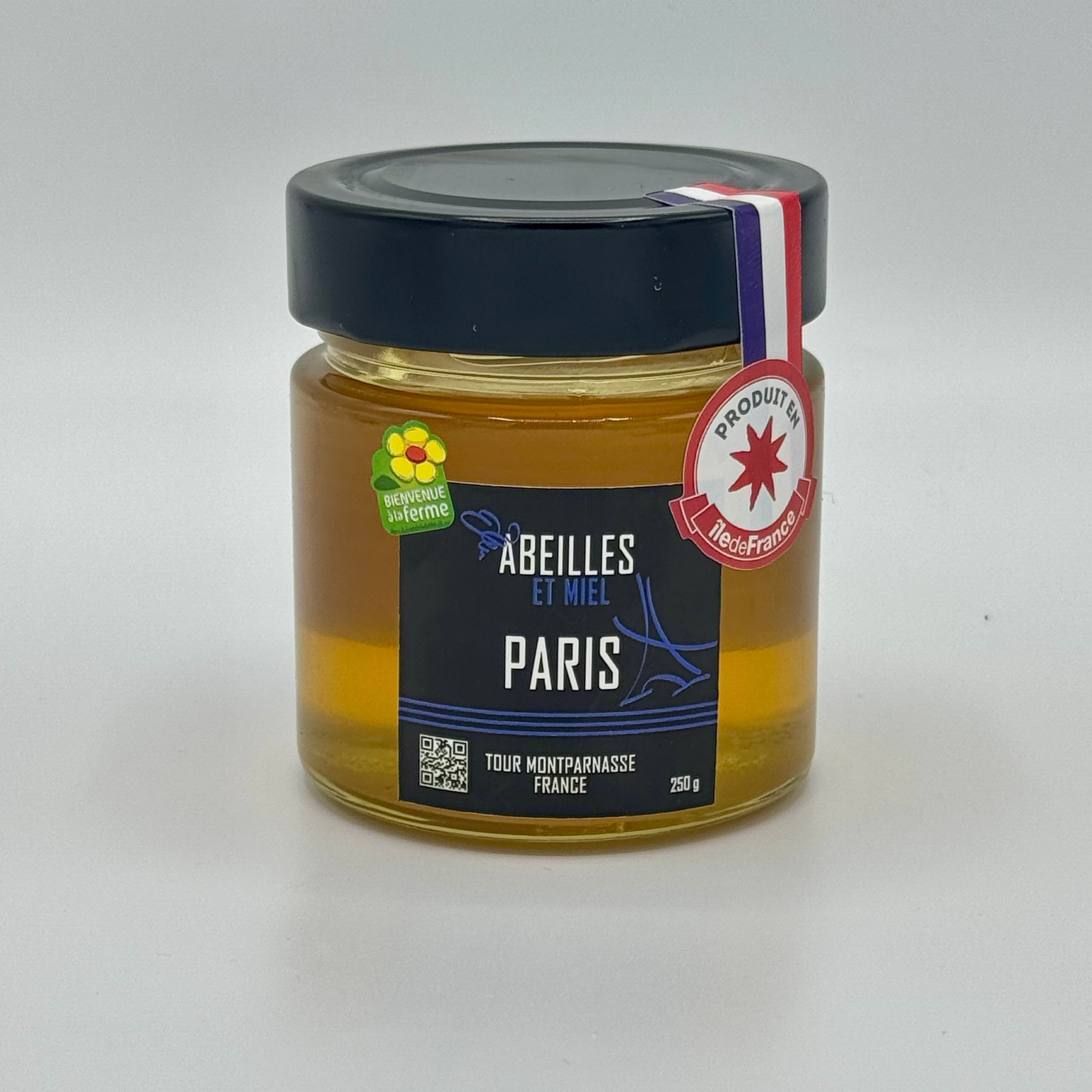 Pot de miel de Paris récolté en apiculture urbaine, au goût floral et délicat.